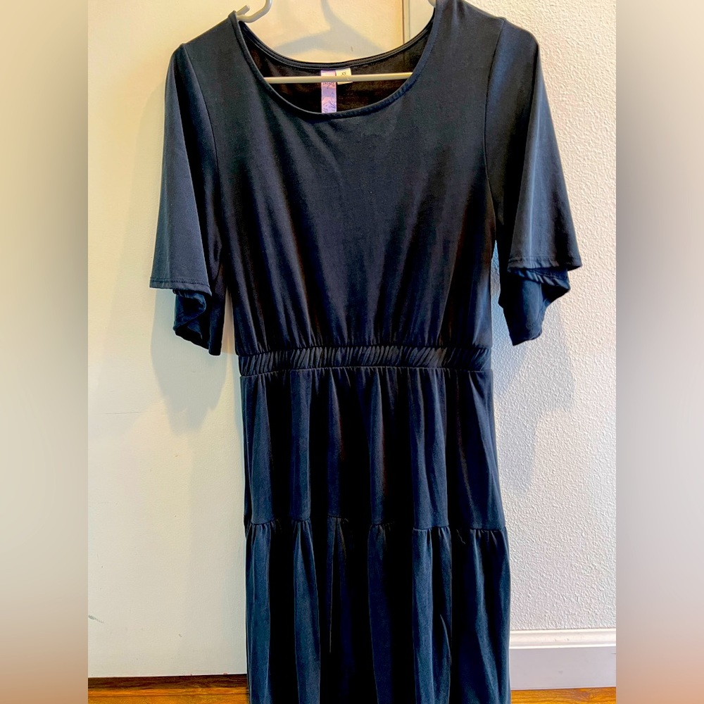 Lightweight black dress with fluttery sleeves